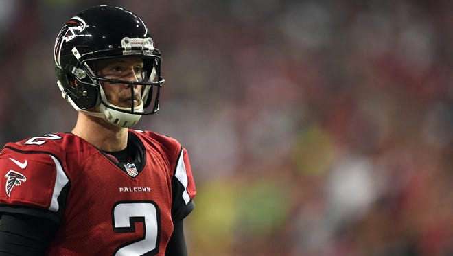 Atlanta Falcons quarterback Matt Ryan (2) waits for the official to whistle to head to the huddle during the 2nd quarter of the NFC Divisional playoff against the Seattle Seahawks at Georgia Dome.