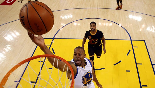 Golden State Warriors forward Andre Iguodala (9) shoots the ball against Cleveland Cavaliers center Tristan Thompson (13) in Game 5 of the NBA Finals at Oracle Arena.