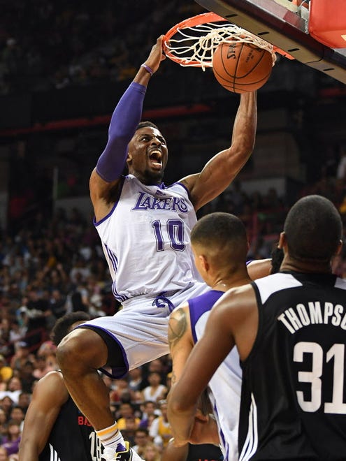 Los Angeles Lakers guard David Nwaba (10) dunks during an NBA Summer League game against the Los Angeles Clippers at Thomas & Mack Center.