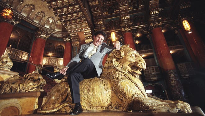 Mike Ilitch, owner of the Fox Theater, is photographed in the lobby of the Fox on July 9, 1987.