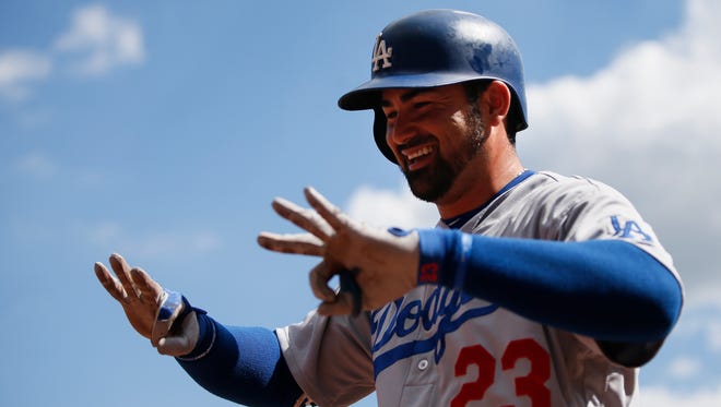 Adrian Gonzalez blasted three home runs Monday to send the Dodgers into a big series against San Francisco with much momentum.