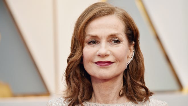 Isabelle Huppert's Repossi ear cuff adds an edgy French je ne sais quoi to her look.