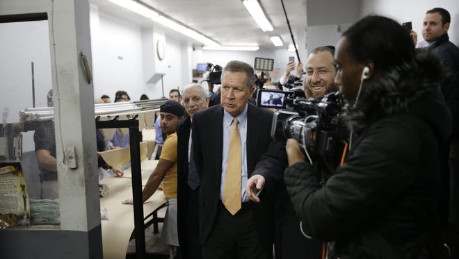 Kasich tours a matzoh factory in New York on April 12, 2016.