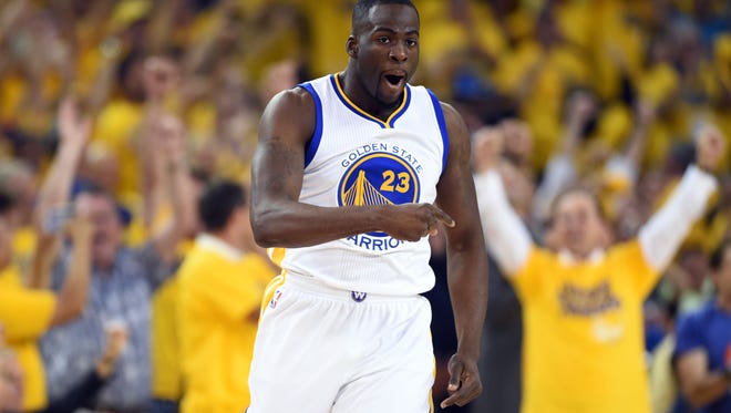Golden State Warriors forward Draymond Green (23) reacts after a play during the first quarter against the Cleveland Cavaliers in game seven of the NBA Finals at Oracle Arena.