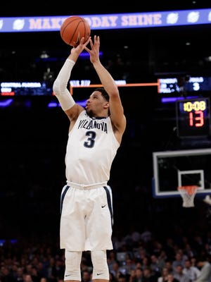 Villanova's Josh Hart (3) shoots a three point basket during the first half of a championship NCAA college basketball game in the finals of the Big East men's tournament Saturday, March 11, 2017, in New York.