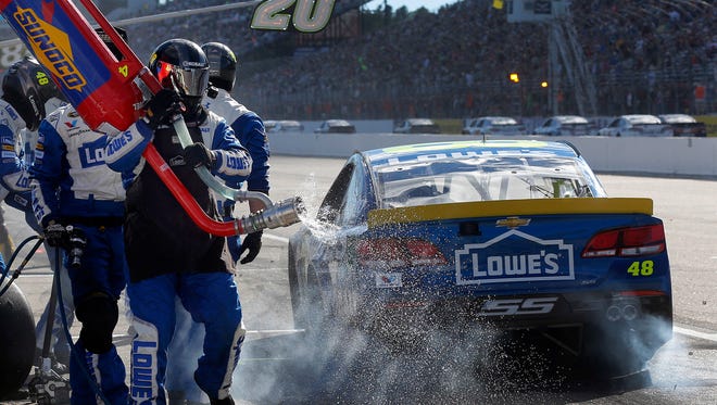 Round 1: Jimmie Johnson leaves the pits after refueling at New Hampshire. Johnson finished eighth.