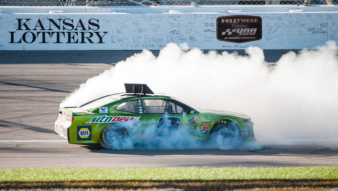 Chase Elliott celebrates with a burnout after  winning the 2018 Hollywood Casino 400 at Kansas Speedway on Oct. 21.