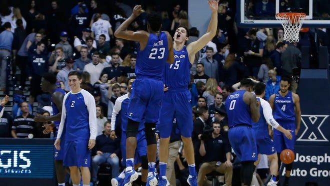 Creighton Bluejays center Justin Patton and forward Martin Krampelj react at the end of the game against the Xavier Musketeers at the Cintas Center.