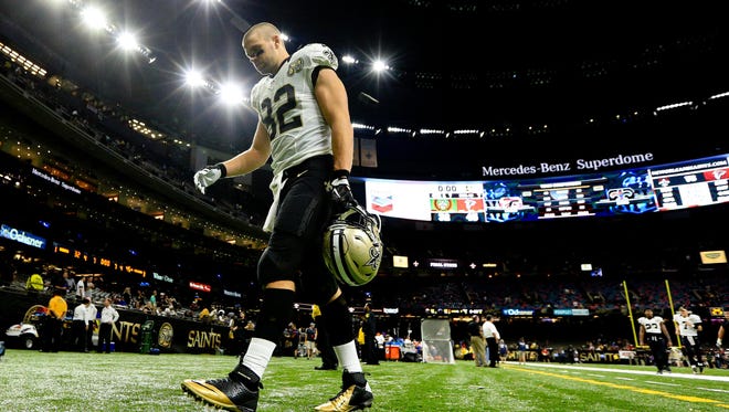 New Orleans Saints tight end Coby Fleener (82) walks off the field following a loss against the Atlanta Falcons in a game at the Mercedes-Benz Superdome.