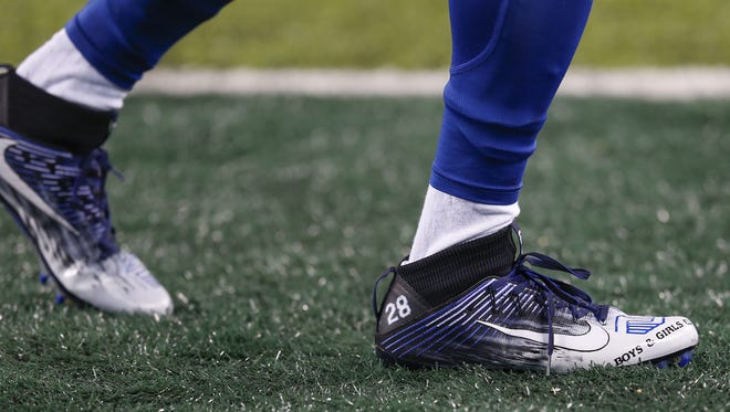 Shoes of Indianapolis Colts running back Jordan Todman (28) before facing off against the New York Jets at MetLife Stadium in East Rutherford, N.J., on Monday, Dec. 5, 2016.