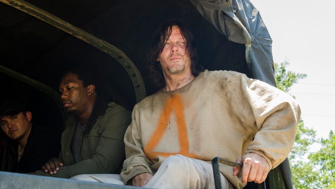 Saviors, Norman Reedus as Daryl Dixon - The Walking Dead _ Season 7, Episode 4 - Photo Credit: Gene Page/AMC