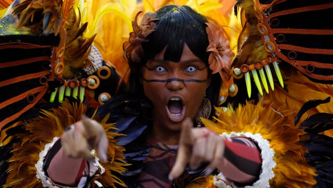 A performer from the Beija Flor samba school parades during Carnival celebrations in Rio de Janeiro on Feb. 27, 2017.