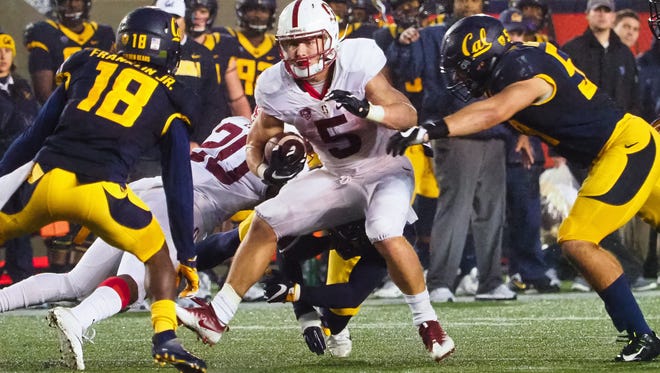 8. *Trade with Panthers* 49ers — Christian McCaffrey, RB, Stanford: The buzz surrounding McCaffrey has steadily grown since his sterling combine and pro day outings, which showcased his abilities as a runner, returner and especially receiver. New Niners GM John Lynch, a Stanford alum himself, could replicate the one-two tailback punch new coach Kyle Shanahan enjoyed in Atlanta if McCaffrey is coupled with power back Carlos Hyde.