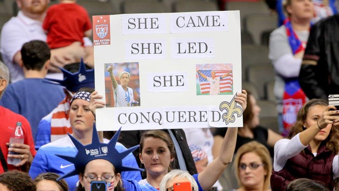 Fans show their support for Wambach.