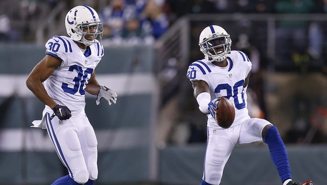 Indianapolis Colts cornerback Darius Butler (20), right, celebrates after intercepting a pass intended for New York Jets wide receiver Brandon Marshall (15) during the 1st half at MetLife Stadium in East Rutherford, N.J., on Monday, Dec. 5, 2016. Also pictured is Indianapolis Colts cornerback Rashaan Melvin (30).