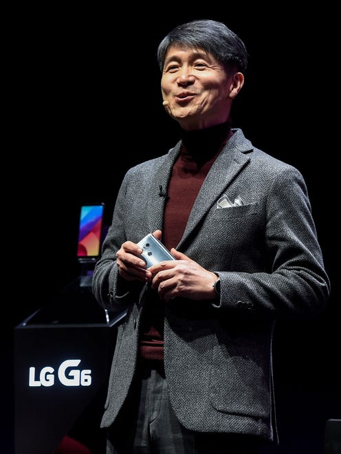 LG's president and CEO, Juno Cho,  presents the company's new model LG G6 during a press conference on the eve of the official start of the Mobile World Congress in Barcelona.