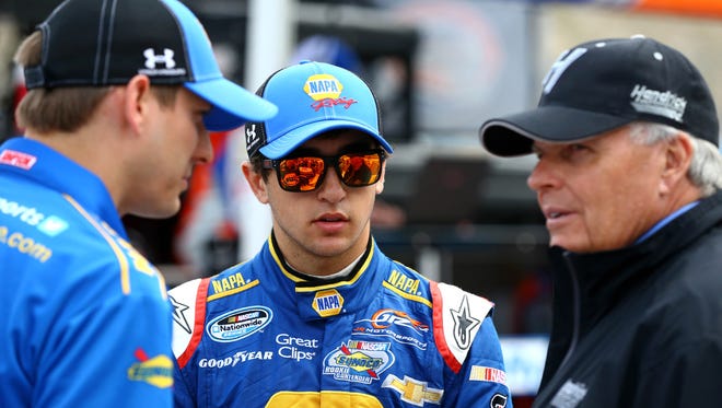 Chase Elliott (center) with crew chief Greg Ives (left) and team owner Rick Hendrick prior to the Blue Jeans Go GreenTM 200 at Phoenix International Raceway.