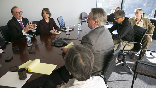 Carlos Manuel Sada Solana, (left) the Mexican ambassador to the U.S. and Claudia Franco Hijuelo,  the consul general of Mexico in Phoenix, speaks to reporters, editors and members of the editorial board of the The Arizona Republic and azcentral.com in Phoenix on  Nov. 30, 2016.