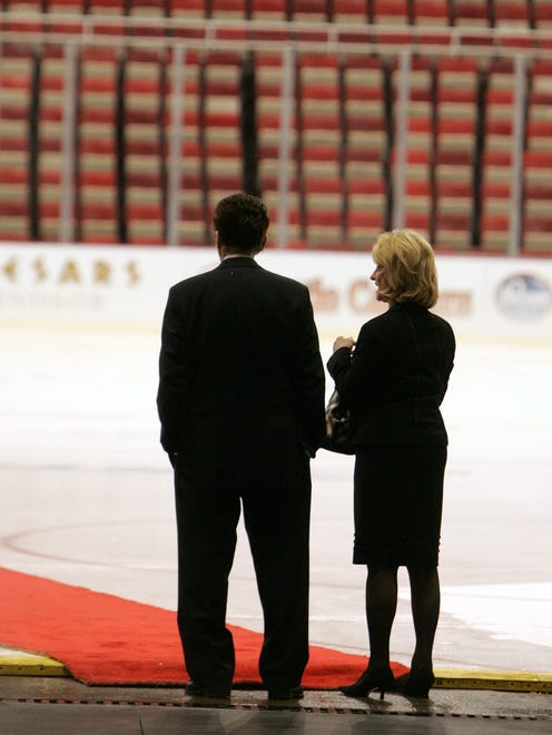 In 2008, Mike and Marian Ilitch share a quiet moment along near the ice before they and the team gather for a team picture.