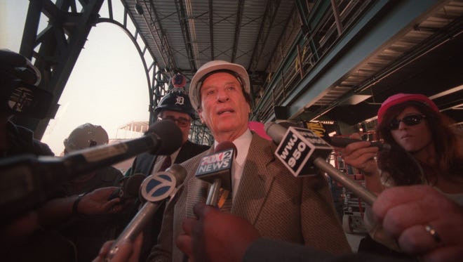 In 1999, Detroit Tigers owner Mike Ilitch toured the construction site of the new home of the Detroit Tigers.