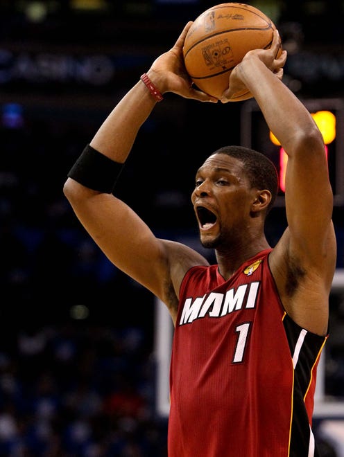 Jun 12, 2012; Oklahoma City, OK, USA; Miami Heat power forward Chris Bosh (1) against the Oklahoma City Thunder during the second quarter of game one in the 2012 NBA Finals at the Chesapeake Energy Arena.  Mandatory Credit: Derick E. Hingle-US PRESSWIRE