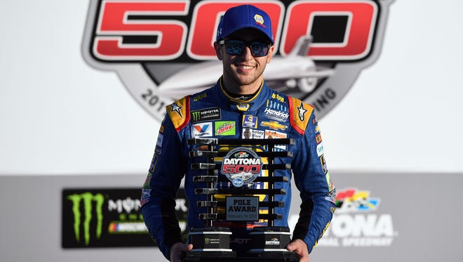Chase Elliott poses with the Daytona 500 pole trophy on Feb. 19, 2017. Elliott earned the top qualifying spot for the second consecutive year.