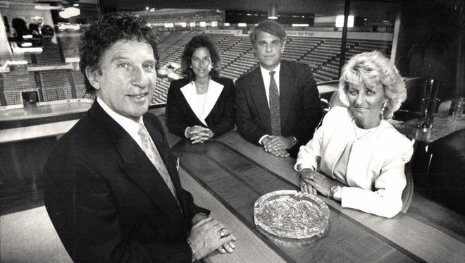 Owner Mike Ilitch's team includes his daughter Denise, the general counsel, his son in law, Jim Lites, the executive vice president, and his wife, Marian, secretary-treasurer. Picture taken in 1988 at the Joe.