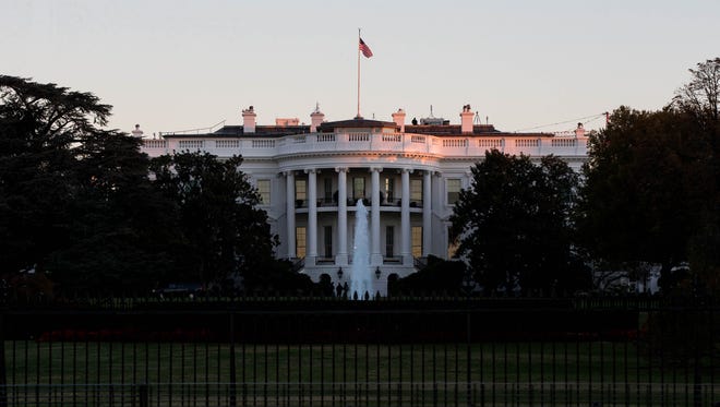 The sun rises near the White House on Nov. 8, 2016.