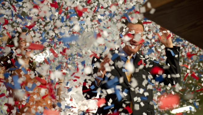 Confetti falls Kasich speaks to supporters at Baldwin Wallace University on March 15, 2015, in Berea, Ohio, after winning the Ohio primary.