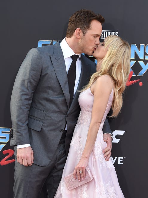Chris Pratt, left, and Anna Faris kiss as they arrive at the world premiere of "Guardians of the Galaxy Vol. 2" at the Dolby Theatre on Wednesday, April 19, 2017, in Los Angeles. (Photo by Jordan Strauss/Invision/AP) ORG XMIT: CAPM124
