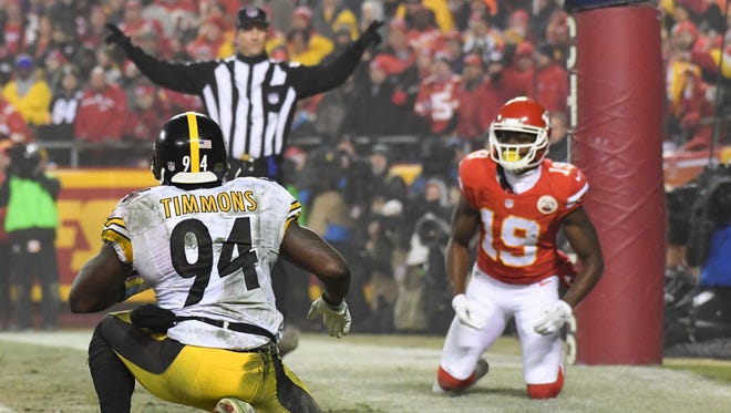 Steelers linebacker Lawrence Timmons (94) gets up after defending Chiefs wide receiver Jeremy Maclin (19) on a two-point conversion attempt during the fourth quarter that would have tied the game.