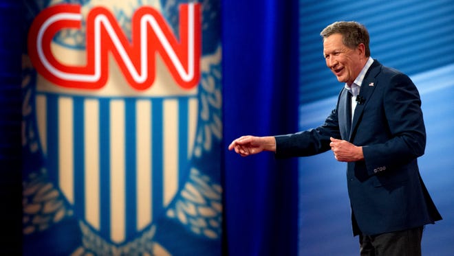 Kasich answers a question from a member of the audience at a CNN town hall at the University of South Carolina in Columbia, S.C., on Feb. 18, 2016.