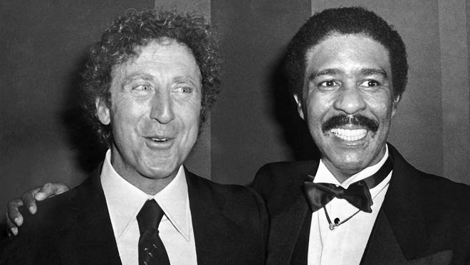 Gene Wilder (left) and Richard Pryor as photographed in December 1980. Wilder and Pryor starred together in comedy films including 'Stir Crazy' and 'Silver Streak.'
