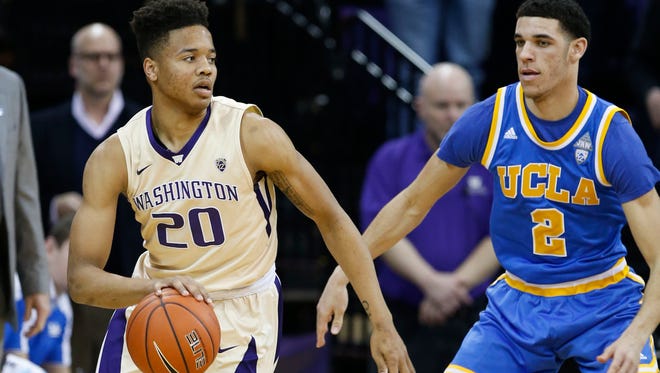 Washington Huskies guard Markelle Fultz (20) dribbles against UCLA Bruins guard Lonzo Ball (2) during the first half at Alaska Airlines Arena at Hec Edmundson Pavilion.