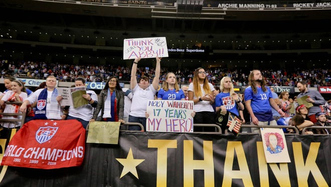 Fans at the Superdome show their love for Wambach.