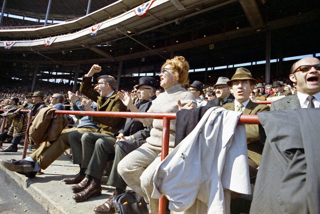 Excited fans react to a play during the Brewers' first opening day on April 7, 1970. The game was also the season opener for the Brewers. A crowd of 37,237 saw the Brewers fall to the California Angels 12-0.