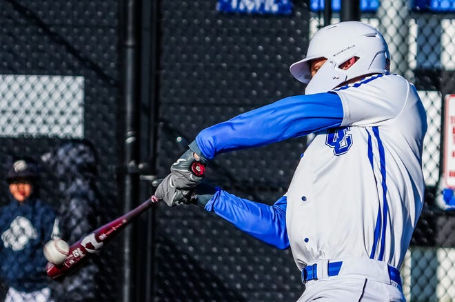 Oak Creek's Payten Jibben (6) connects during the game at home against Racine Horlick, Friday, April 19, 2024.