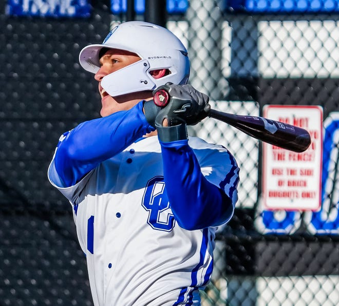 Oak Creek's Payten Jibben (6) drives one to center field during the game at home against Racine Horlick, Friday, April 19, 2024.