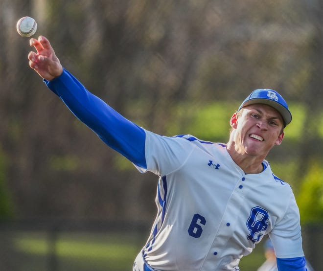 Oak Creek's Payten Jibben (6) delivers a pitch during the game at home against Racine Horlick, Friday, April 19, 2024.