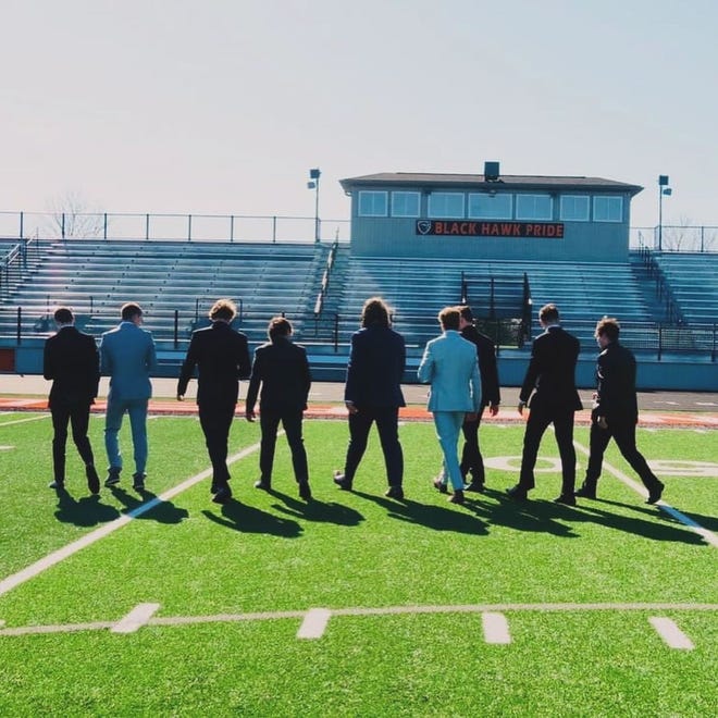 Trading in their football pads for a prom tux. Grafton High School students visited the football field before their prom on Saturday, April 13, 2024.