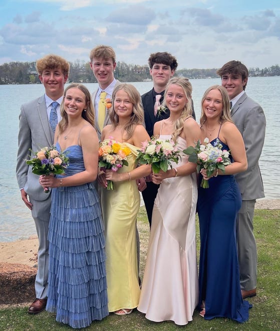 Arrowhead High School students (back row, from left) Kyler Farrow, Peter Kussow, Mac Bong, Preston Manthei, (front row, from left) Sydney Mikulak, Kennedy Klubertanz, Avery Fitzgerald and Addie Williams pose for prom photos on Saturday, April 27, 2024, at Chenequa Country Club.