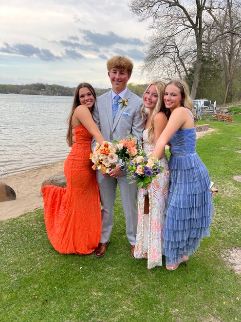 Arrowhead High School students (from left) Ava Nowak, Kyler Farrow, Catarina Romagna and Sydney Mikulak pose for a prom photo on Saturday, April 27, 2024, at Chenequa Country Club. The school's dance was held at the Brookfield Conference Center.