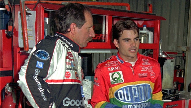 Gordon, right, chats with the late Dale Earnhardt before the Cup race at Pocono on June 15, 1996. Gordon won the race for his fifth of 10 victories that year.