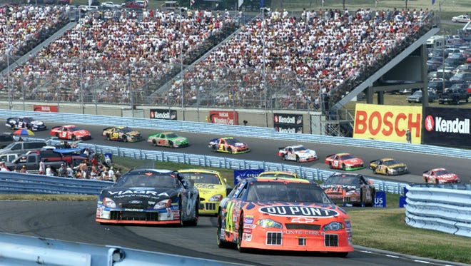 Gordon, leading the pack through the road course at Watkins Glen on Aug. 11, 2002, won three races that season and finished fourth in the standings.