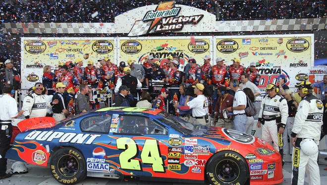 Gordon celebrates with his crew in victory lane after winning the Daytona 500 for the third time on Feb. 20, 2005.