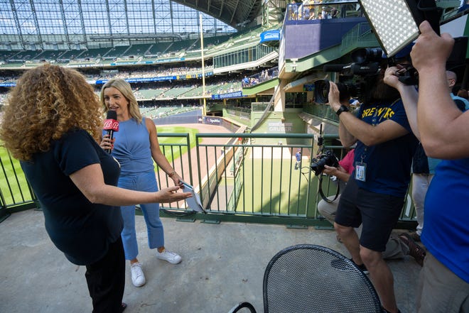 Milwaukee Brewers reporter Sophia Minnaert, right, interviews UW-Madison Chancellor Jennifer L. Mnookin during the team’s game against the Tampa Bay Rays Wednesday, August 10, 2022 at American Family Field in Milwaukee, Wis.